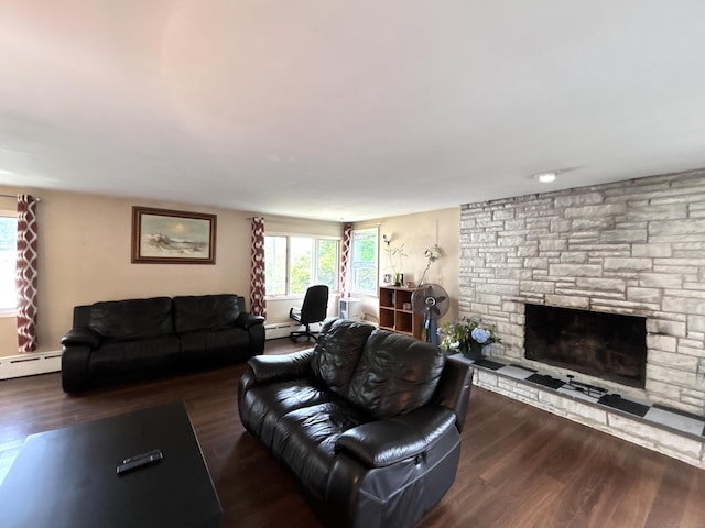 2 Wentworth Dr, Milford, CT 06460 - living area featuring wood finished floors, a baseboard radiator, and a stone fireplace
