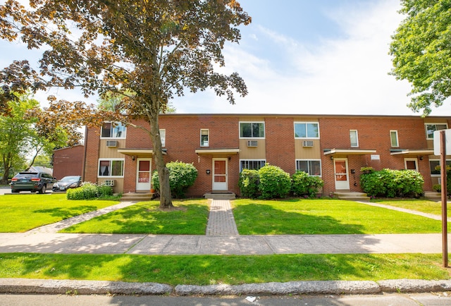 275 Pierremount Ave Unit 275, New Britain, CT 06053 - townhome / multi-family property featuring brick siding and a front lawn