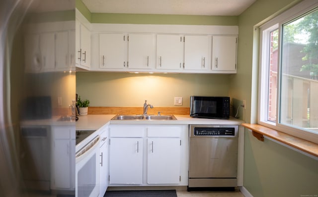 275 Pierremount Ave Unit 275, New Britain, CT 06053 - kitchen with dishwasher, black microwave, white electric range, and light countertops