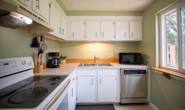 275 Pierremount Ave Unit 275, New Britain, CT 06053 - kitchen featuring stainless steel dishwasher, white electric stove, black microwave, under cabinet range hood, and light countertops