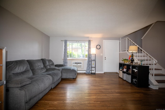 275 Pierremount Ave Unit 275, New Britain, CT 06053 - living room featuring dark wood finished floors, stairs, and a wall mounted air conditioner