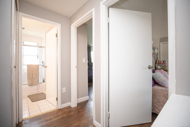 275 Pierremount Ave Unit 275, New Britain, CT 06053 - hall with wood finished floors and baseboards