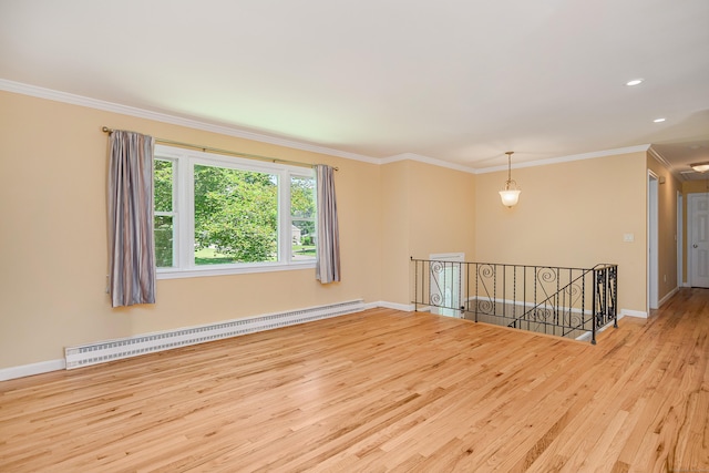 15 Sky Edge Ln, Bethel, CT 06801 - unfurnished room with a baseboard heating unit, wood finished floors, crown molding, attic access, and recessed lighting