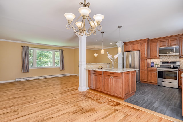15 Sky Edge Ln, Bethel, CT 06801 - kitchen featuring stainless steel appliances, baseboard heating, wood finished floors, brown cabinets, and ornamental molding