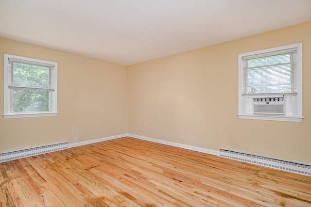 15 Sky Edge Ln, Bethel, CT 06801 - unfurnished room featuring baseboard heating, cooling unit, and hardwood / wood-style flooring