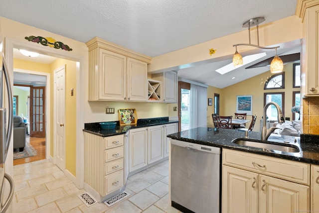 35 Grandview Ter, Wethersfield, CT 06109 - kitchen featuring stainless steel dishwasher, cream cabinets, a skylight, dark stone countertops, and lofted ceiling