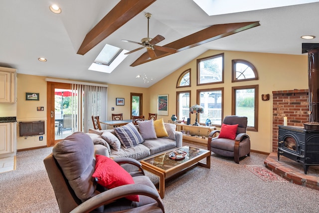 35 Grandview Ter, Wethersfield, CT 06109 - living room with a skylight, a wood stove, a ceiling fan, carpet floors, and recessed lighting