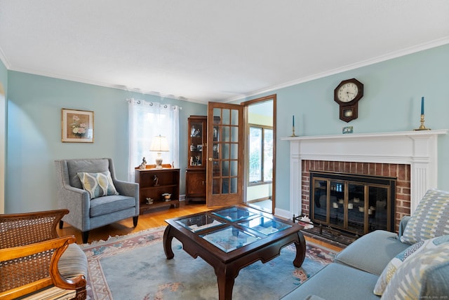 35 Grandview Ter, Wethersfield, CT 06109 - living room with crown molding, wood finished floors, and a brick fireplace