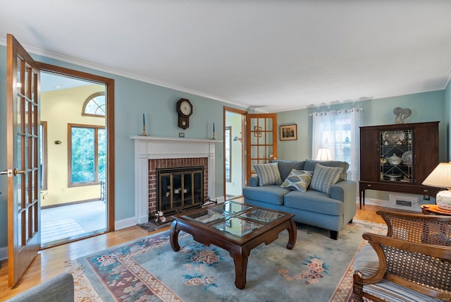35 Grandview Ter, Wethersfield, CT 06109 - living room with ornamental molding, wood finished floors, and a brick fireplace