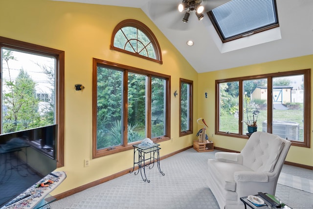 35 Grandview Ter, Wethersfield, CT 06109 - living area with carpet flooring, a skylight, a ceiling fan, and high vaulted ceiling