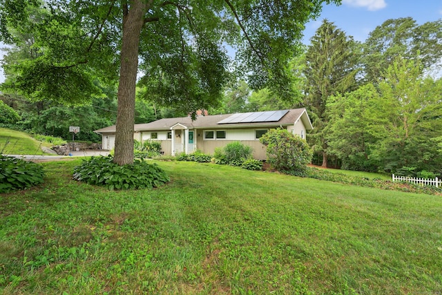 3 Laurel Hill Dr S, East Lyme, CT 06357 - ranch-style home featuring a front yard, solar panels, an attached garage, driveway, and a chimney