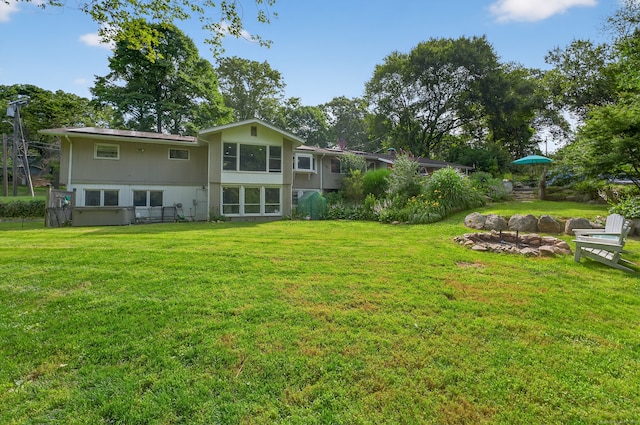 3 Laurel Hill Dr S, East Lyme, CT 06357 - back of house featuring a yard