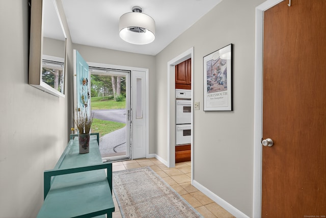 3 Laurel Hill Dr S, East Lyme, CT 06357 - entryway featuring light tile patterned flooring and baseboards