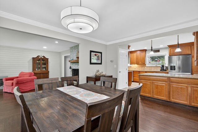 3 Laurel Hill Dr S, East Lyme, CT 06357 - dining area featuring dark wood-style flooring, a fireplace, ornamental molding, and recessed lighting