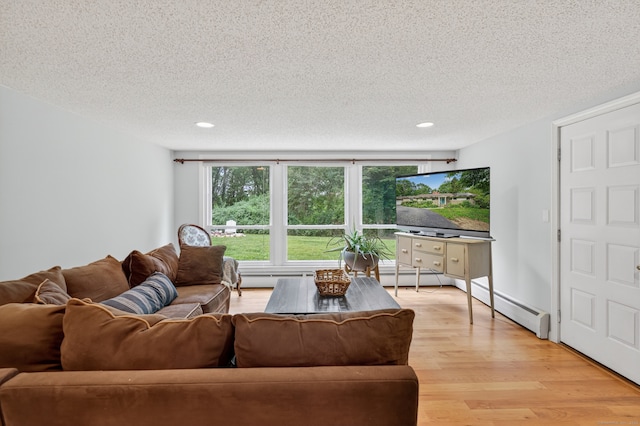3 Laurel Hill Dr S, East Lyme, CT 06357 - living area featuring a textured ceiling, light wood-style floors, baseboard heating, and recessed lighting