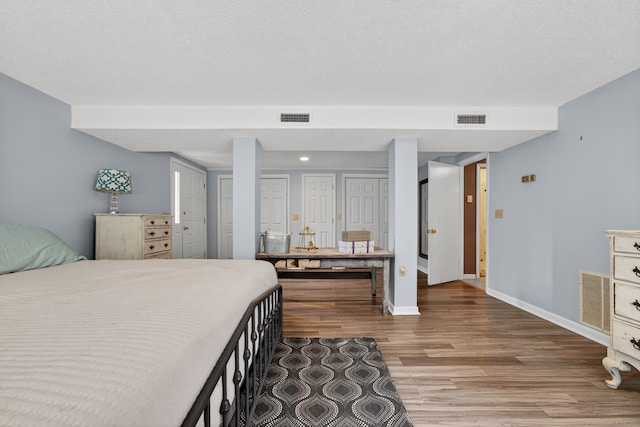 3 Laurel Hill Dr S, East Lyme, CT 06357 - bedroom with wood finished floors and baseboards