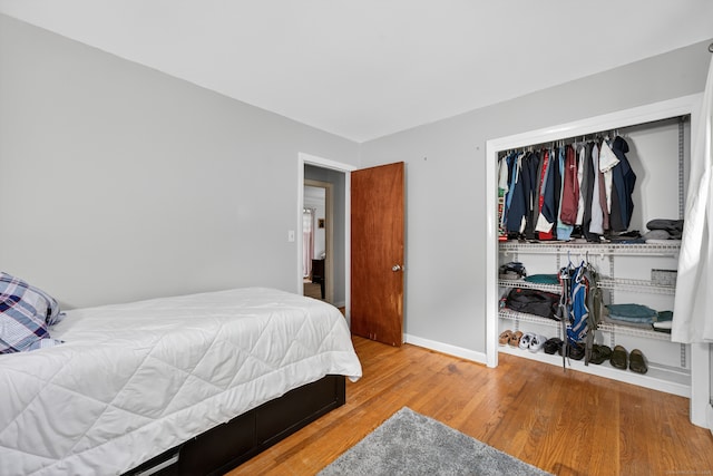 3 Laurel Hill Dr S, East Lyme, CT 06357 - bedroom featuring wood finished floors and a closet