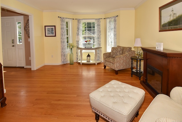 55 Hydrangea Ln, Suffield, CT 06078 - sitting room with wood finished floors and crown molding