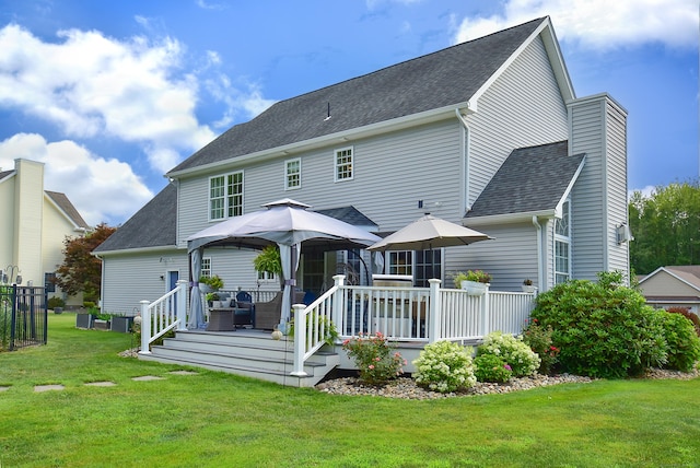 55 Hydrangea Ln, Suffield, CT 06078 - rear view of property with a deck, a yard, an outdoor living space, and roof with shingles
