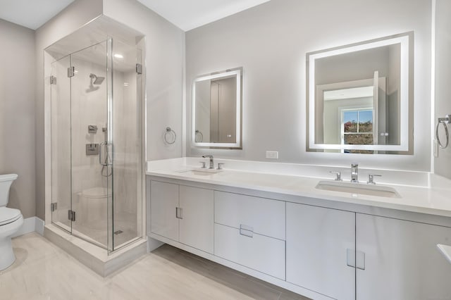 888 Oldfield Rd, Fairfield, CT 06824 - bathroom featuring a shower stall, double vanity, and tile patterned floors