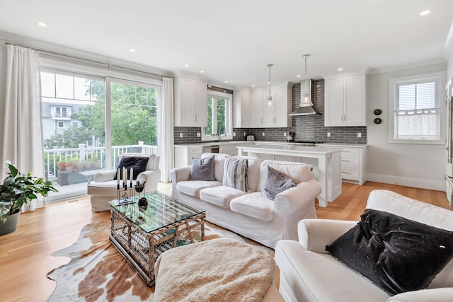 888 Oldfield Rd, Fairfield, CT 06824 - living area featuring light wood finished floors and recessed lighting