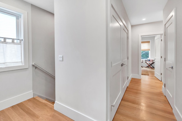 888 Oldfield Rd, Fairfield, CT 06824 - hall featuring light wood-type flooring, an upstairs landing, and recessed lighting