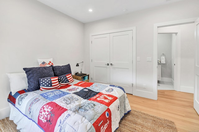 888 Oldfield Rd, Fairfield, CT 06824 - bedroom with light wood-type flooring, recessed lighting, and a closet