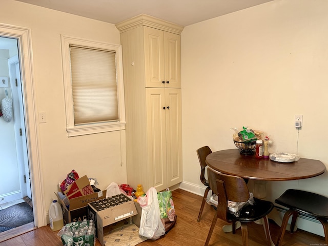 271 Jeniford Rd, Fairfield, CT 06824 - dining space featuring wood finished floors and baseboard heating