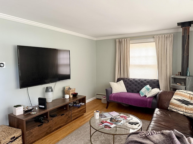 271 Jeniford Rd, Fairfield, CT 06824 - living area featuring wood finished floors, crown molding, a baseboard radiator, and a wood stove