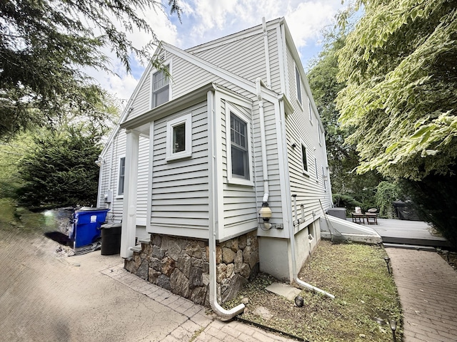 271 Jeniford Rd, Fairfield, CT 06824 - view of side of property with a deck