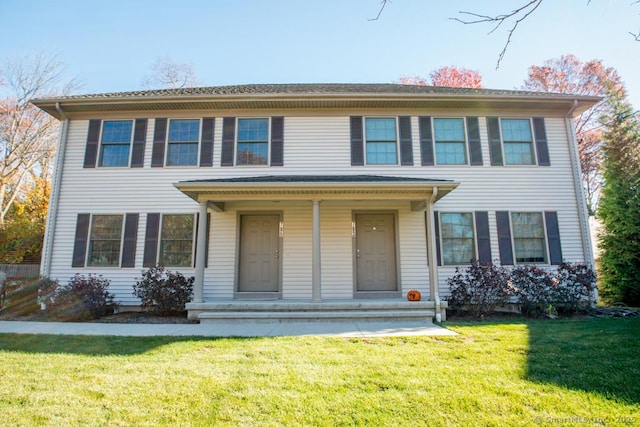 783 Naugatuck Ave, Milford, CT 06461 - colonial house featuring covered porch and a front yard