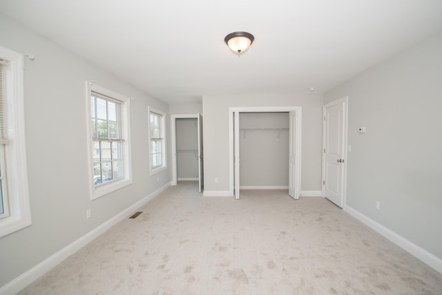 783 Naugatuck Ave, Milford, CT 06461 - unfurnished bedroom with light carpet
