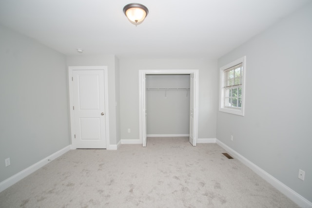 783 Naugatuck Ave, Milford, CT 06461 - unfurnished bedroom featuring carpet flooring and a closet