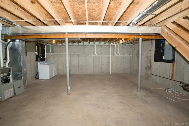 783 Naugatuck Ave, Milford, CT 06461 - unfinished basement featuring separate washer and dryer and heating unit