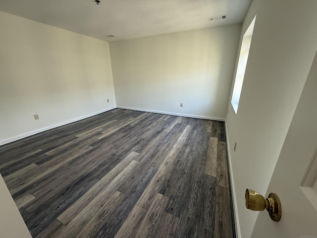 449 Judd Sq Unit 449, Wallingford, CT 06492 - empty room with dark wood-style flooring and baseboards