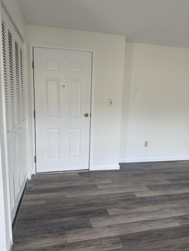 449 Judd Sq Unit 449, Wallingford, CT 06492 - entrance foyer with baseboards and dark wood-style floors
