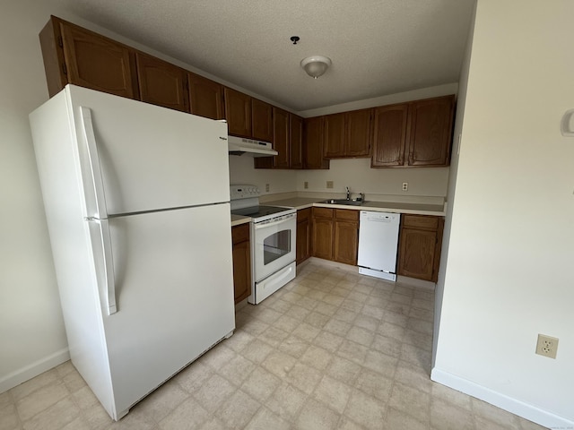 449 Judd Sq Unit 449, Wallingford, CT 06492 - kitchen featuring white appliances, under cabinet range hood, light floors, and light countertops
