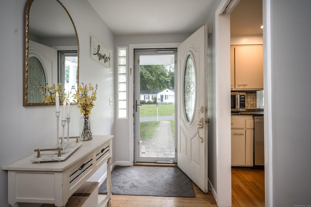 16 Westview Dr, Bethel, CT 06801 - entryway with light wood-style flooring and arched walkways