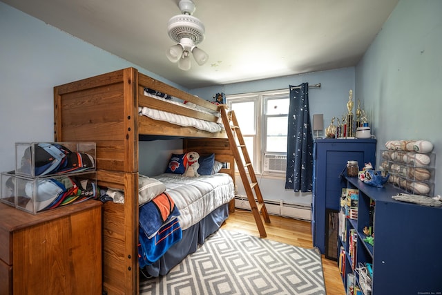 16 Westview Dr, Bethel, CT 06801 - bedroom featuring baseboard heating and wood finished floors