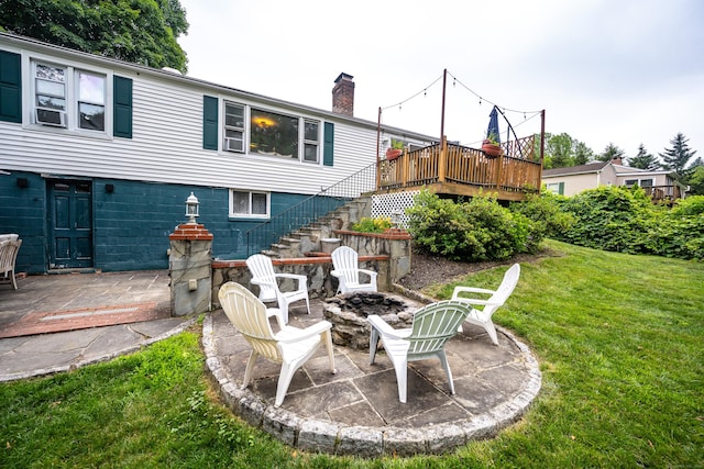 16 Westview Dr, Bethel, CT 06801 - back of house featuring stairs, a fire pit, a lawn, a patio area, and a chimney