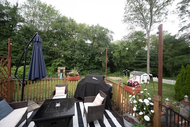 16 Westview Dr, Bethel, CT 06801 - deck featuring a storage unit, a grill, an outdoor hangout area, and view of scattered trees