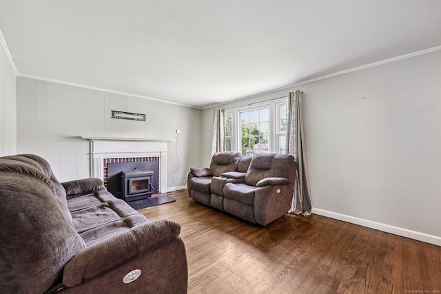 17 Burke Rd, Vernon, CT 06066 - living room featuring a wood stove, ornamental molding, and wood finished floors