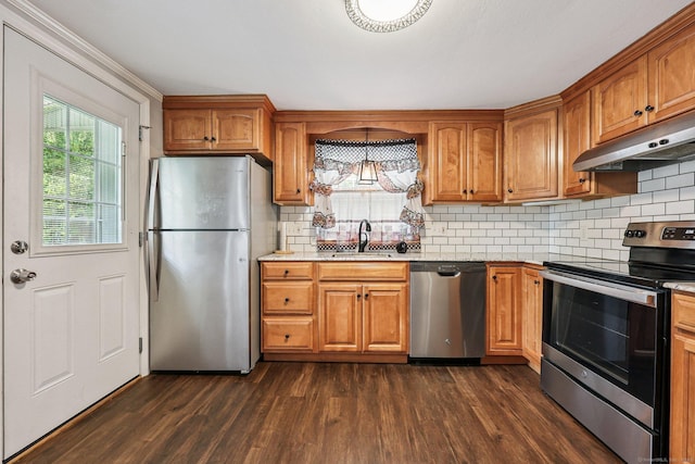 17 Burke Rd, Vernon, CT 06066 - kitchen featuring stainless steel appliances, under cabinet range hood, dark wood finished floors, tasteful backsplash, and brown cabinets