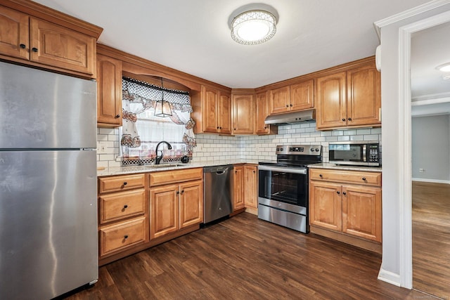 17 Burke Rd, Vernon, CT 06066 - kitchen featuring stainless steel appliances, under cabinet range hood, dark wood-type flooring, backsplash, and brown cabinets