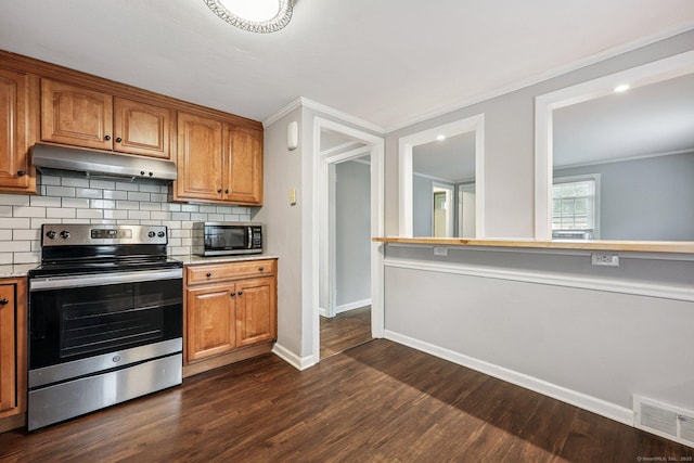 17 Burke Rd, Vernon, CT 06066 - kitchen with stainless steel appliances, under cabinet range hood, decorative backsplash, dark wood finished floors, and light countertops