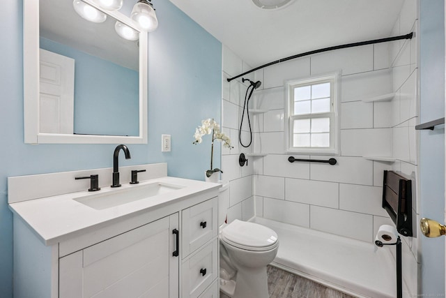 17 Burke Rd, Vernon, CT 06066 - full bathroom featuring vanity, wood finished floors, and tiled shower