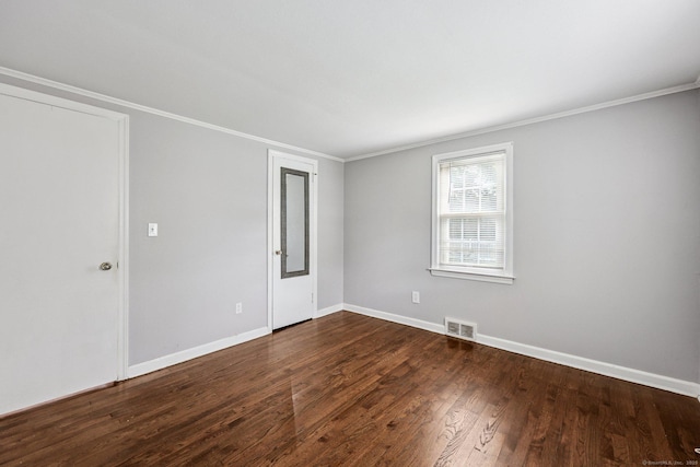 17 Burke Rd, Vernon, CT 06066 - unfurnished room featuring crown molding and dark wood-style flooring