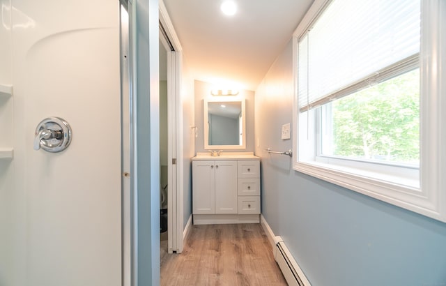 635 Ruth St, Bridgeport, CT 06606 - hall featuring light wood-style flooring and a sink