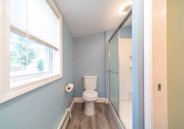 635 Ruth St, Bridgeport, CT 06606 - full bathroom featuring a stall shower and wood finished floors