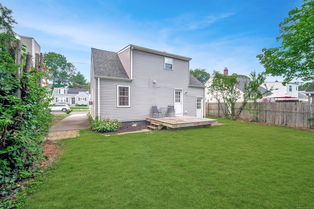 635 Ruth St, Bridgeport, CT 06606 - back of house featuring a deck and a shingled roof